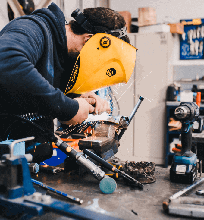 Welder working in the industrial sector.